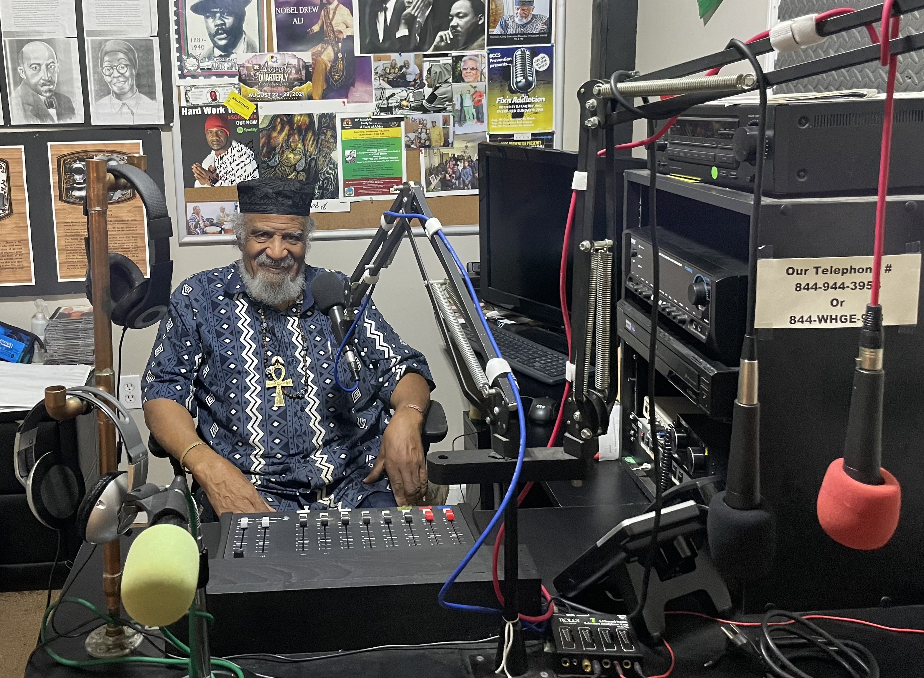 a man sits in a radio station