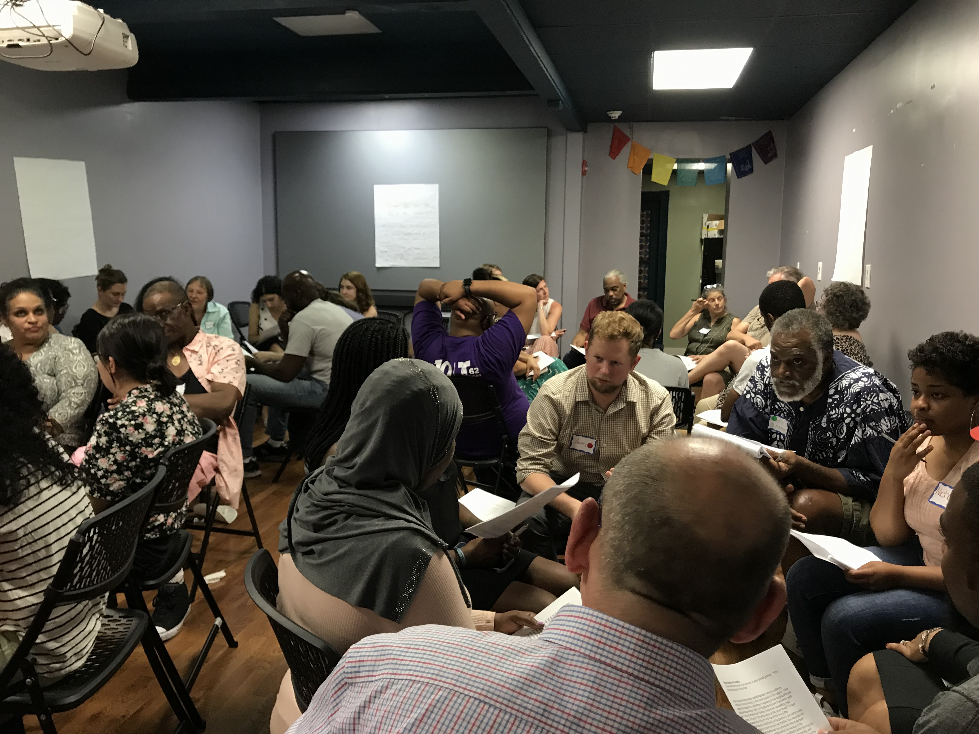 a group of people at a community meeting