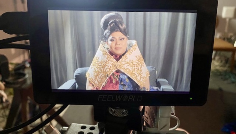 a drag artist featured on a camera screen